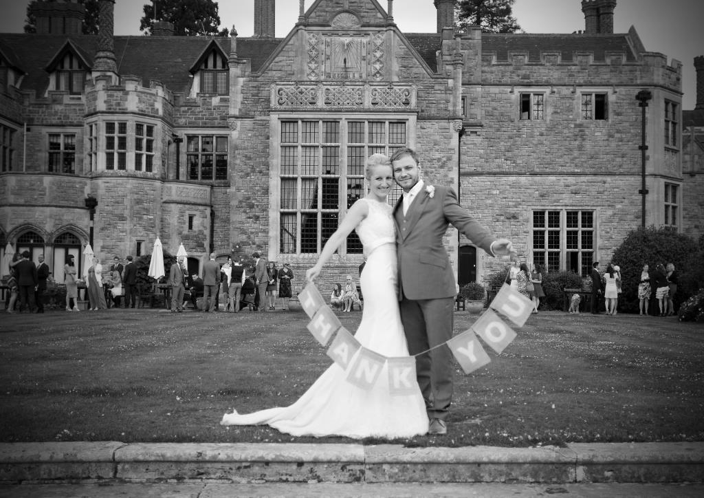Thank you say the bride and groom at Rhinefield House by wedding photographer Henry Szwinto